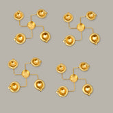 Set of gold earrings on a gray background
